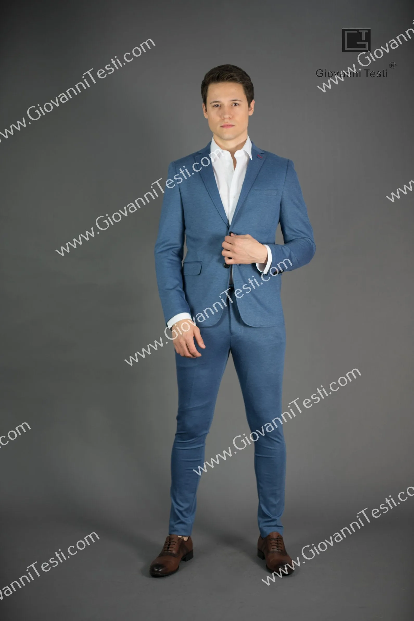 Giovanni Testi 2 button stretch Medium Blue Travel Suit GTRVL2N-01 M.BLUE